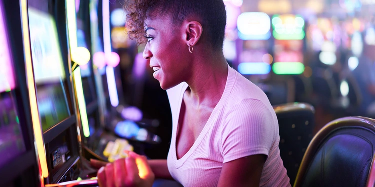 Woman at a slot machine